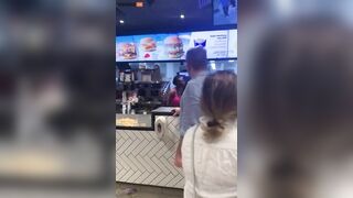 Wild Woman Jumps Over McDonald's Counter And Screams Like B