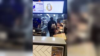 Wild Woman Jumps Over McDonald's Counter And Screams Like B