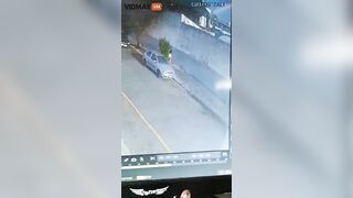 Woman Hit By Wall After Bus Drives By - Video