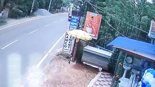 Woman Opens Umbrella While Traveling