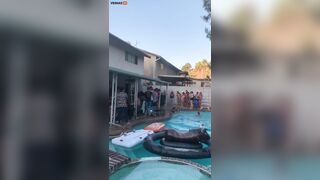 Woman Tries To Jump From Roof Into Swimming Pool – Video – VidMax.com