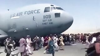 Afghans Board And Fall Off Plane 