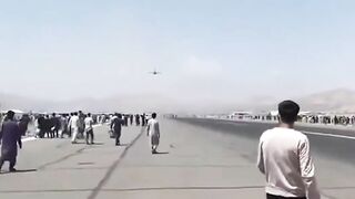 Afghans Board And Fall Off Plane 