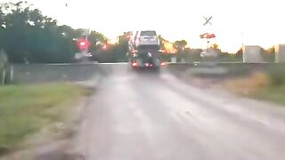 Amtrak Train Hits Semi-truck Transporting A Car