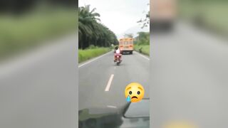 Cycling Couple Tries To Overtake School Bus But Goes Wrong 