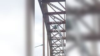 Dude Jumps Off A High Bridge 