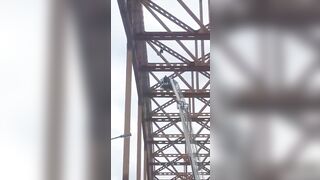 Dude Jumps Off A High Bridge 