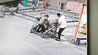 Worker Rolls Into Machine 