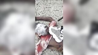 Gang Member Shows Off His Latest Murder And His Gucci Socks