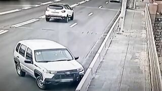 Guy Randomly Jumps Off Bridge 