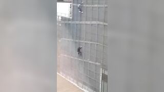 Guy Climbs Building And Falls 