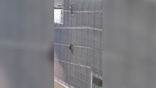 Guy Climbs Building And Falls 