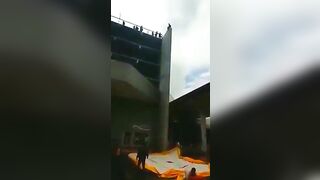 Man Jumps From Top Of Mall 