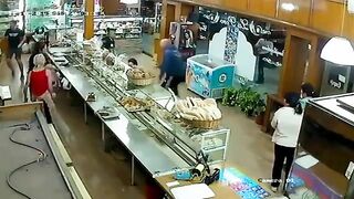 Man Shoots Woman Dead In Cafe 