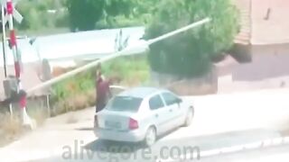 Old Coot Park Car Trying To Open Car At Railroad Crossing