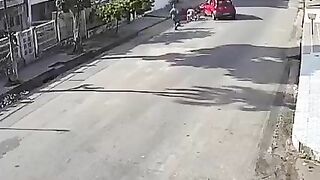 Red Car Hits Biking Couple Head-on 