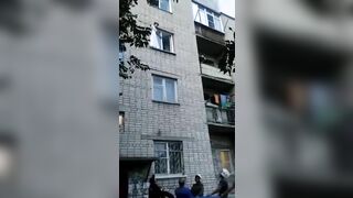 Russian Woman Falls From Third Floor Wearing Wedding Dress