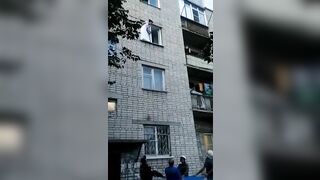 Russian Woman Falls From Third Floor Wearing Wedding Dress