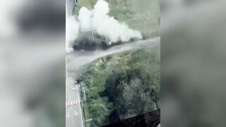 Russian Soldier Hit By Explosion While Crossing Road