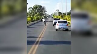 Stupid Cyclist Causes Accident 