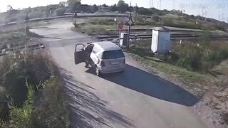 Stupid Driver Tries To Cross Train 