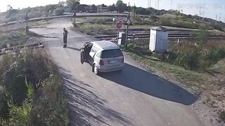 Stupid Driver Tries To Cross Train 