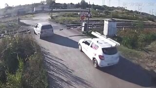 Stupid Driver Tries To Cross Train 