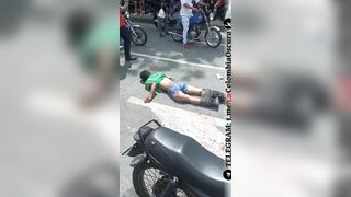 Crowd Beats Man Who Kills Woman