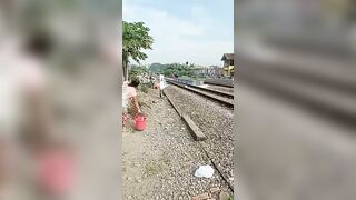 Seconds After Indonesian Woman Was Hit And Killed By Train During Tower Base