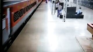 Train Passenger Falls On Tracks 