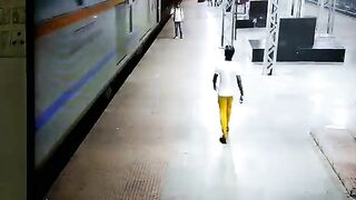 Train Passenger Falls On Tracks 