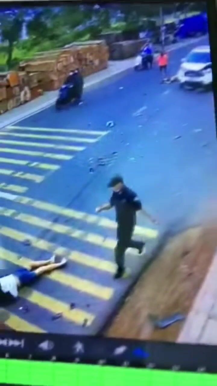 Two Motorcyclists Driving The Wrong Way And Crashing Into A Car