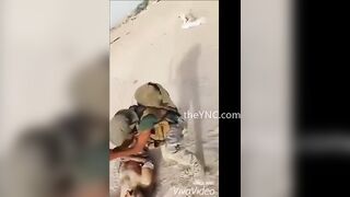 Angry Iraqi Soldiers Behead A Dead ISIS Member