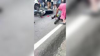 Creepy Woman Tastes Blood Of Dead Cyclist On Street