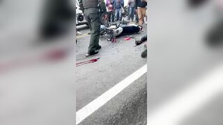 Creepy Woman Tastes Blood Of Dead Cyclist On Street