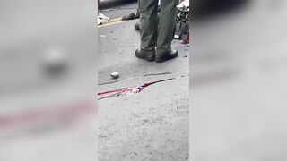 Creepy Woman Tastes Blood Of Dead Cyclist On Street