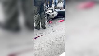 Creepy Woman Tastes Blood Of Dead Cyclist On Street