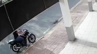 Biker Attacks Woman