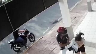 Biker Attacks Woman