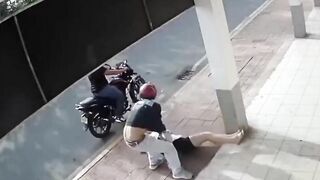 Biker Attacks Woman