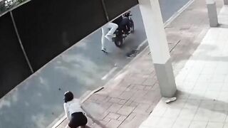 Biker Attacks Woman