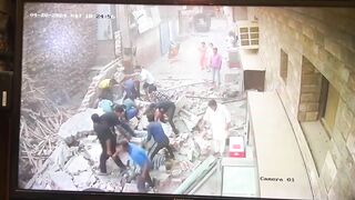 Four Killed After Wall Collapses