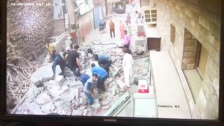 Four Killed After Wall Collapses