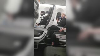 Two Men Punch Each Other On Air Vent During Flight