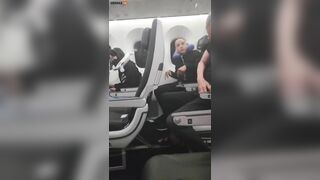 Two Men Punch Each Other On Air Vent During Flight