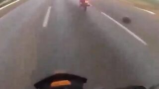 Wheel Falls Off And Hits Motorcyclist In The Head 