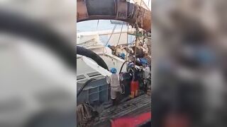 A Dead Fisherman Was Pulled Out Of The Cargo Hold By A Crane