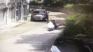 A Huge Piece Of Wood Fell On The Head Of A Passing Motorcycle