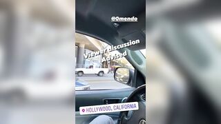 A Man Jumps Headfirst From A Bridge Into The Street 