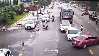 A Truck Hit An Elderly Woman Crossing The Road